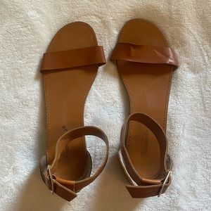 Brown sandal with ankle strap